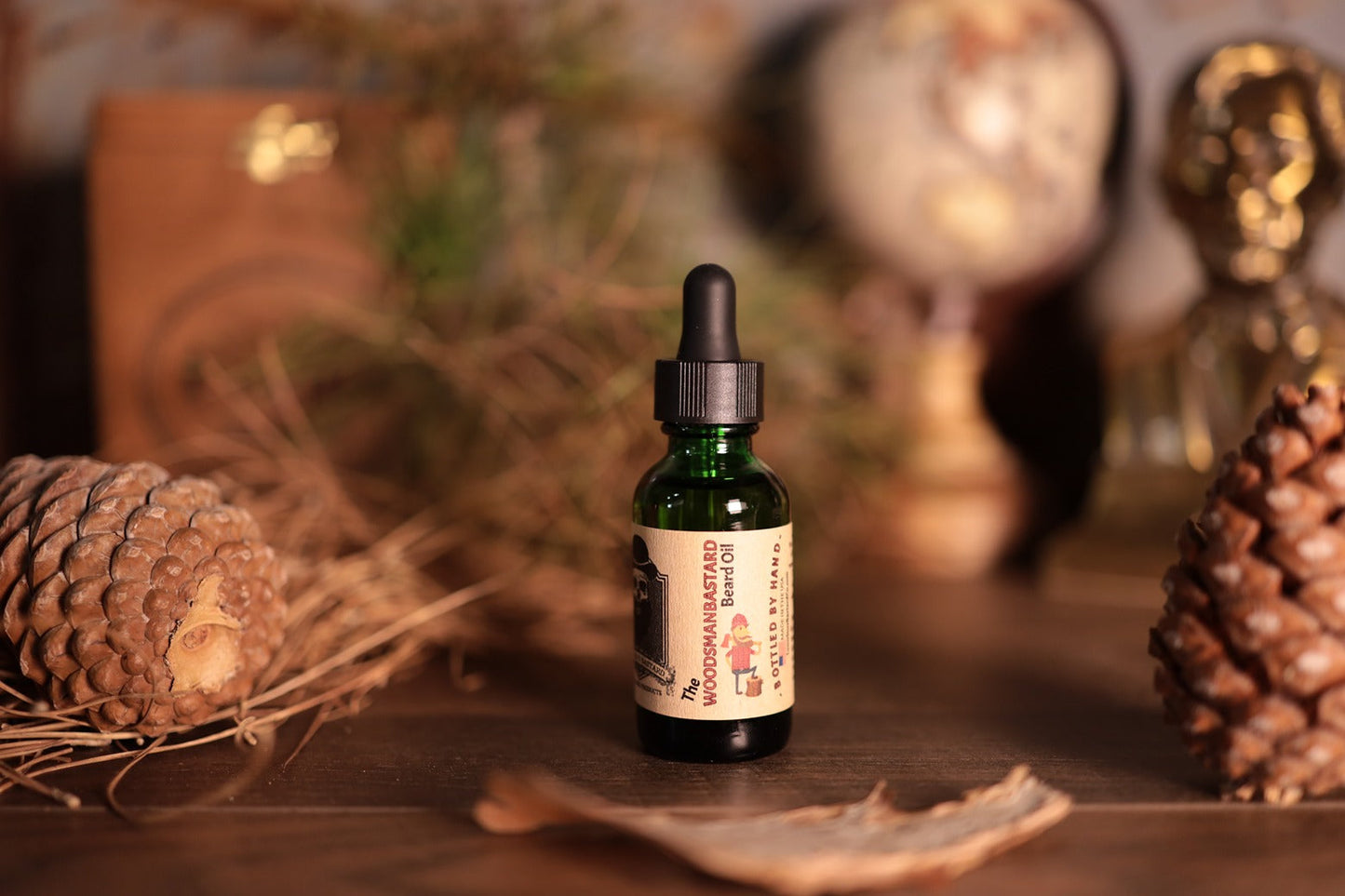 1oz green bottle Woodsman beard oil with dropper top
